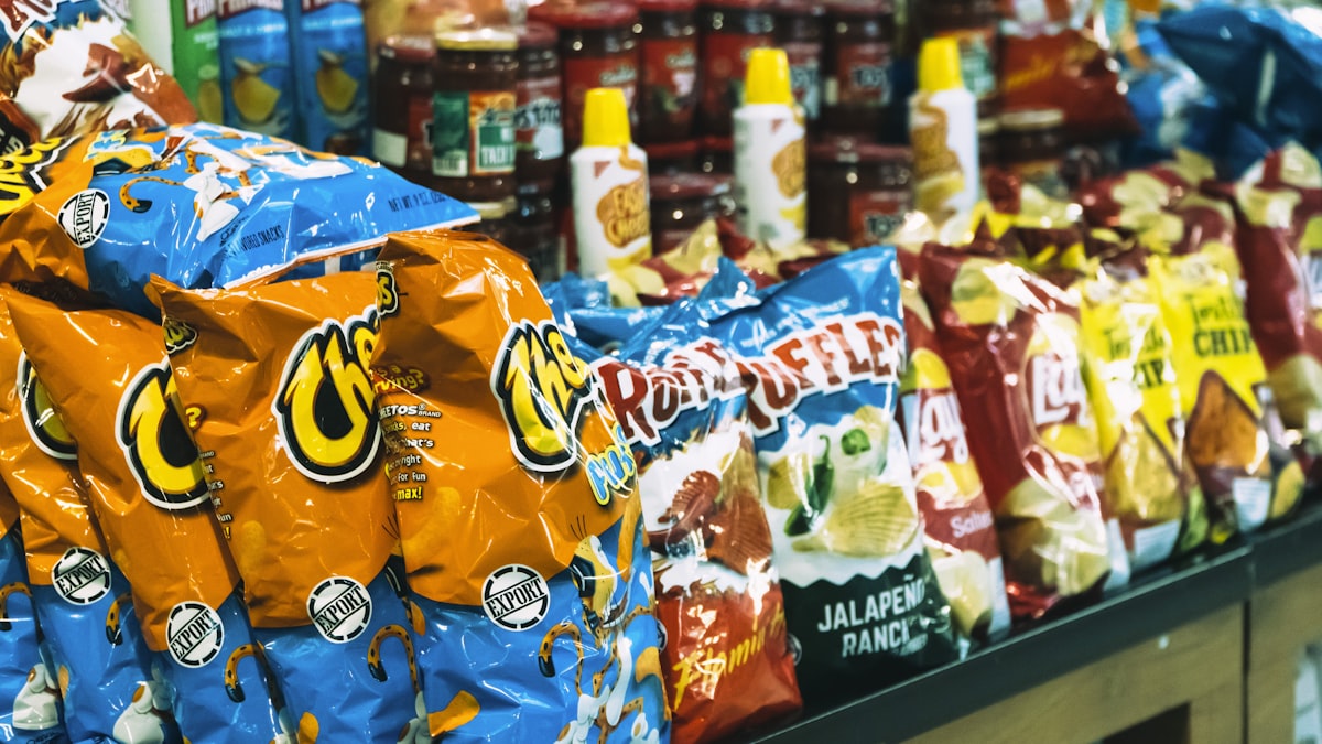 Packed food on supermarket shelves